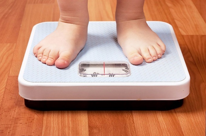 Bambini obesi: genitori da sorvegliare